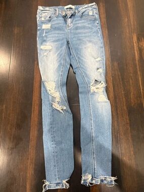 Ripped Light Blue Skinny Jeans for Women